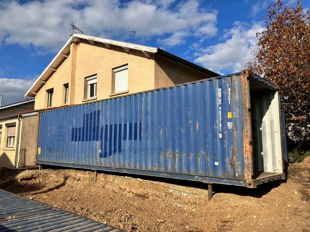 Agrandissement en container